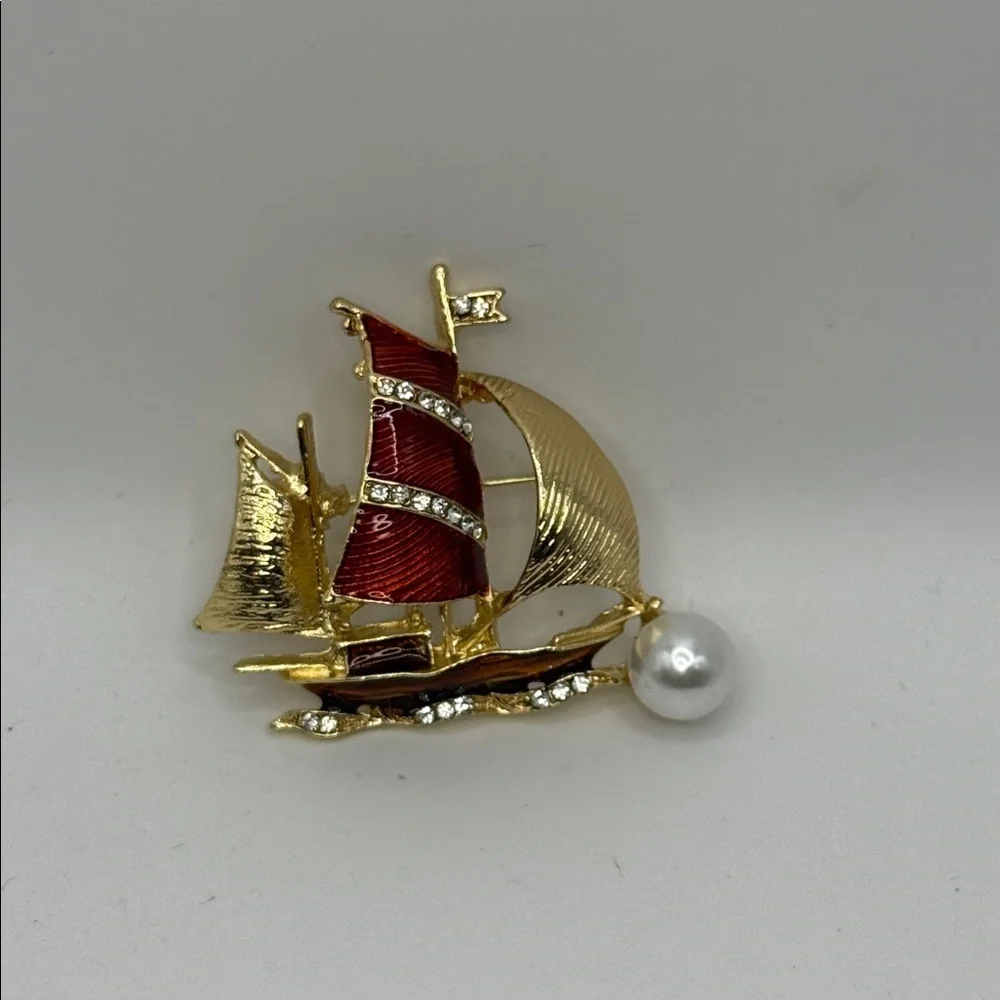 3/$25 Gold Tone and Red Sailboat Brooch with Rhinestone and Faux Pearl Accent